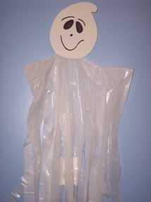 Free Halloween craft instructions and full size pattern to make a Ghost Windsock.
