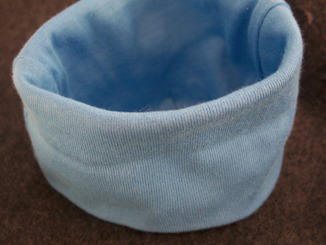 Craft instructions for making a baby hat flower
