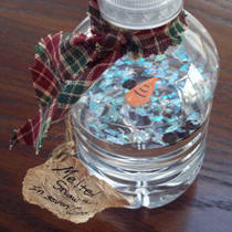 Melted Snowman Winter holiday craft is made from a recycled water bottle