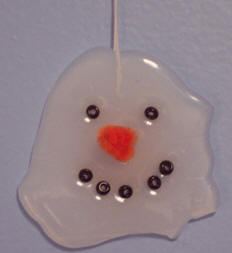 Holiday Christmas tree ornament - instructions to craft a melted snowman from hot glue