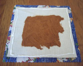 add muslin, cinnamon & glue; step 3 crafting scented hot pads