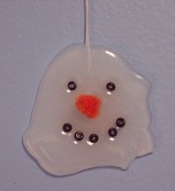 Craft a snowman Christmas ornament for your holiday with hot glue