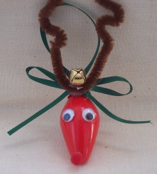 Craft a reindeer ornament for your Christmas tree from a recycled Christmas bulb