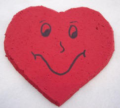 Craft a heart shaped cork coaster with a smiley face